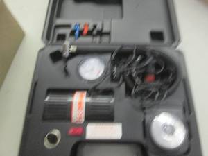 lot 83 image: portable air pump 12 volt...