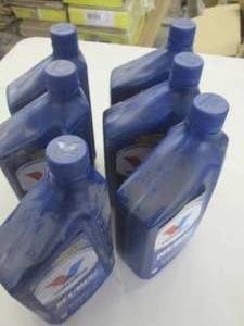 lot 208 image: 6 quarts of valvoline dexmerc ...