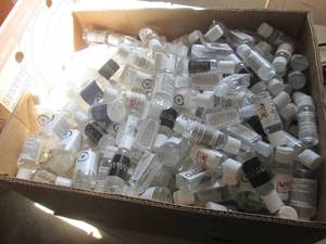 lot 214 image: box of 2 floz and 1floz bottles of ...