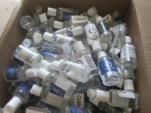 lot 221 image: box of 2floz bottles of hand saniti...