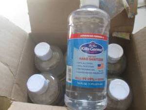 lot 223 image: 6-16floz bottles of hand sanitizer ...
