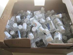 lot 231 image: small box of 1 and 2floz bottles of...