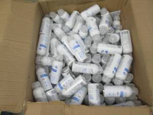 lot 234 image: big box full of eon sanitizing mist...