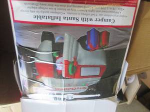 lot 243 image: camper with santa inflatable untest...