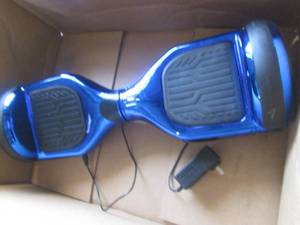 lot 249 image: blue hoverboard powers on ...