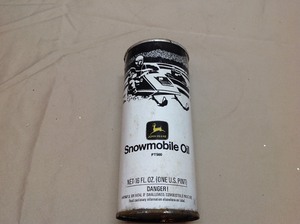 lot 99 image: Vintage John Deere Snowmobile Oil
