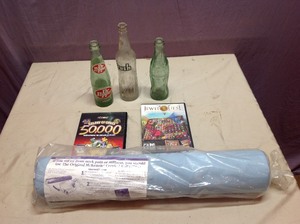 lot 70 image: McKenzie Cervical Roll, Games, Bottles