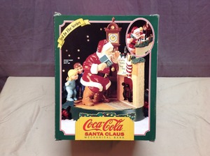lot 145 image: Coca-Cola Mechanical Bank