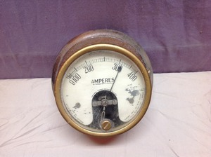 lot 146 image: Vintage Amperes Gauge Mounted on Wood