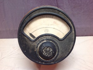 lot 147 image: Vintage GE Amperes Gauge Mounted on Wood