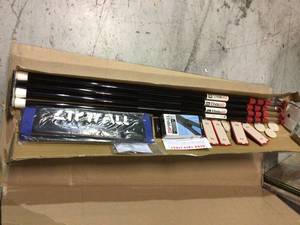 lot 62 image: ZipWall ZP4 Contains 4 10 ft. Steel Spring Loaded Poles 4-Heads, 4-Plates, 4-Tethers, 4-Grip Disks, 2-Zippers and 1-Carry Bag Customer Returns See Pictures 