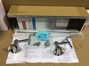 lot 63 image: Porter 18 in. Towel Bar with Glass Shelf in Chrome by Delta Customer Returns See Pictures 
