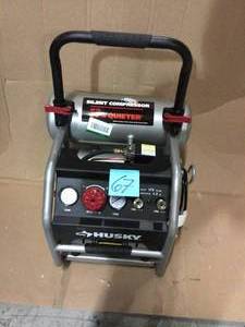 lot 67 image: 4.5 Gal. Portable Electric-Powered Silent Air Compressor by Husky Customer Returns See Pictures 