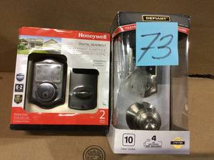 lot 73 image: ( 1 ) HONEYWELL DIGITAL DEADBOLT PLUS ( 1 ) DEFIANT TOUCHSCREEN DEADBOLT Customer Returns See Pictures 