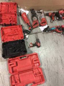 lot 102 image: Lot of assorted Milwaukee tools customer return used some missing pieces or in need of repair see pictures