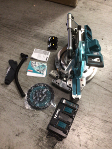 lot 105 image: Makita 18-Volt X2 LXT Lithium-Ion (36-Volt) 12 in. Brushless Dual-Bevel Sliding Compound Miter Saw kit not used see pictures