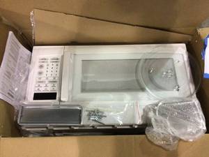 lot 78 image: 1.6 cu. ft. Over the Range Microwave in White by Unbranded Customer Returns See Pictures 