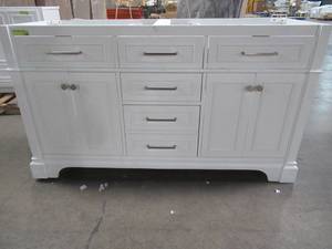 lot 416 image: Windlowe 61 in. W x 22 in. D x 35 in. H Bath Vanity in White. Missing Top. Slight Crack on Upper Corner Brace.