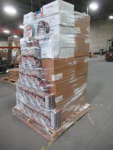lot 325 image: WHOLESALE MIXED PALLET OF AUTOMOBILE SPARK PLUGS, SEAT COVERS, AIR FILTERS AND MORE
