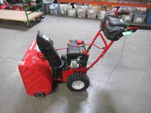 lot 6 image: Troy-Bilt 24 in. 208 cc Two-Stage Gas Snow Blower with Electric Start Self Propelled Storm 2410