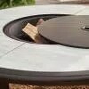 lot 92 image: Whitfield 48 in. Round Galvanized Steel Wood Burning Fire Pit Table in Dark Brown with Stone Look Tile Top by Hampton Bay