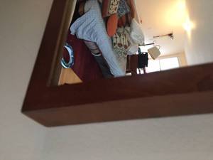 lot 104 image: Wood framed IKEA Stave Wall Mirror