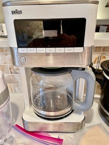lot 75 image: Hamilton Beach Crock Pot, Braun Coffee Pot, and a Gourmia Vegetable Slicer