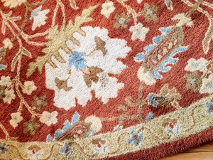 lot 6 image: Large Round Area Rug