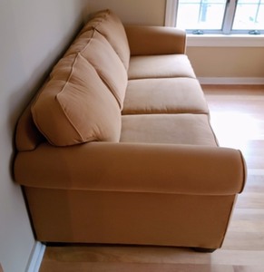 lot 32 image: Lovely Light Gold Colored Sofa