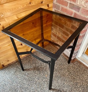 lot 230 image: Black Metal Accent Table with a Glass Top