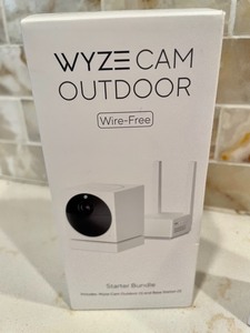 lot 313 image: WYZE Cam Outdoor Wire Free Starter Bundle