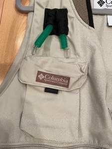 lot 409 image: Columbia Vest, Mountainsmith Back Fanny Pack and a Stanley Thermos