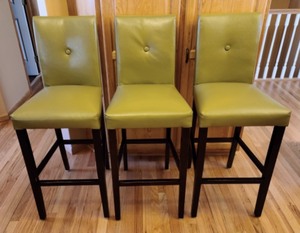 lot 3 image: Green Upholstered Pier One Stools