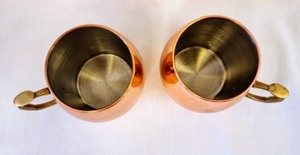 lot 153 image: Pair of Oggi Copper Mugs
