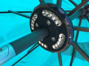 lot 244 image: Patio Umbrella w Battery Operated Lights