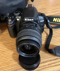 lot 105 image: Nikon AF-S DX VR Zoom Camera and 55-200mm Lens