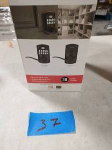 lot 37 image: KWICKSET 917 SmartCode Venetian Bronze Electronic Single-Cylinder Tustin Door Lever Featuring SmartKey Security