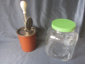 lot 64 image: Antique Green Depression square jar...