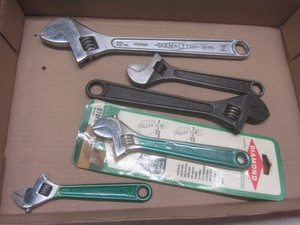 lot 131 image: Diamond Caulk 12 and 8 adjustable...