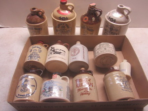 lot 293 image: Pottery jugs, whiskey...