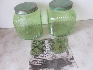 lot 22 image: Vintage green square jars with labe...