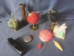 lot 329 image: Sewing pin cushions including figu...