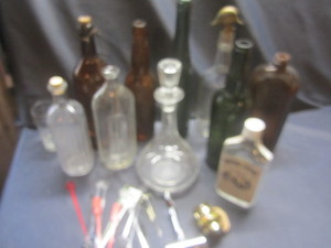 lot 458 image: Liquor bottles, stir sticks, Cavali...