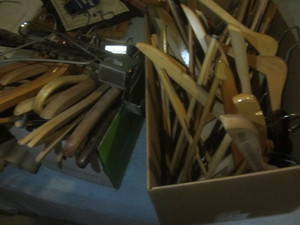 lot 490 image: Wooden clothes hangers, over the do...