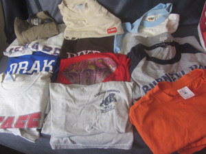 lot 395 image: Tee shirts, mostly XL...