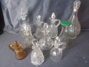 lot 411 image: Cruets, eight with amber, decanter,...