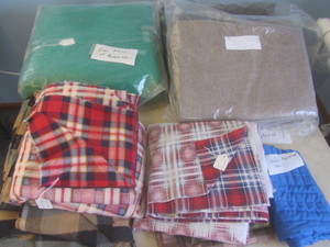 lot 432 image: Wool & shirt material...