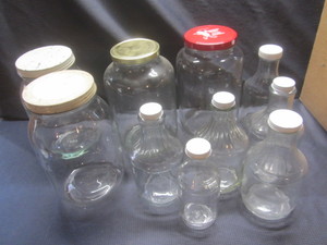 lot 444 image: Four gallon jars, five glass jugs...