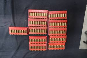 lot 76 image: EMPTY BRASS CASINGS