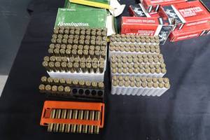 lot 77 image: EMPTY BRASS CASINGS